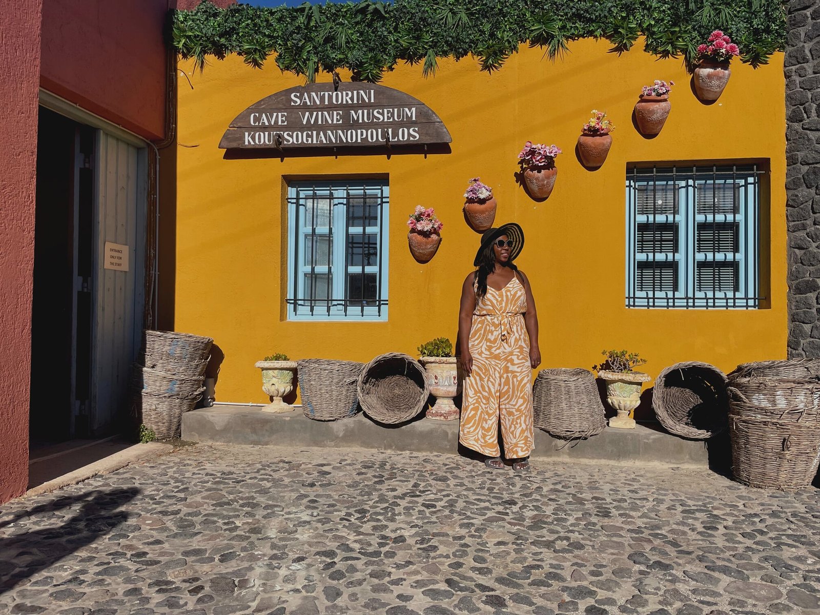 Lisa Lasley visiting a winery in Santorini